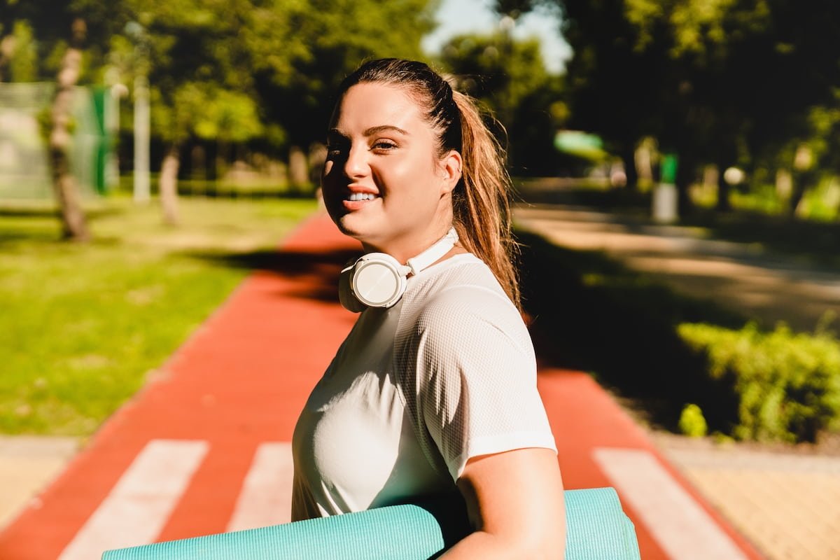 young woman exercising outdoors