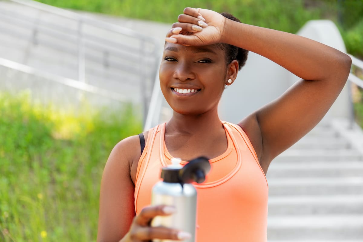 young woman exercising outside